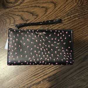 Kate Spade black w floral pattern full sz wristlet wallet